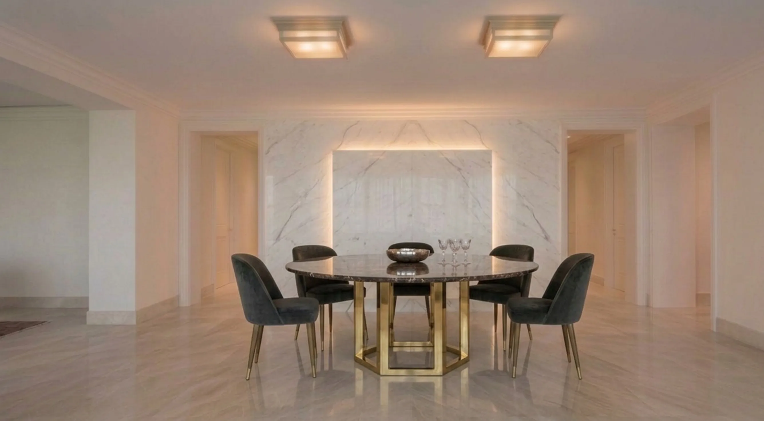 View of 2 antique ceiling lights in an elegant dining room with a round table