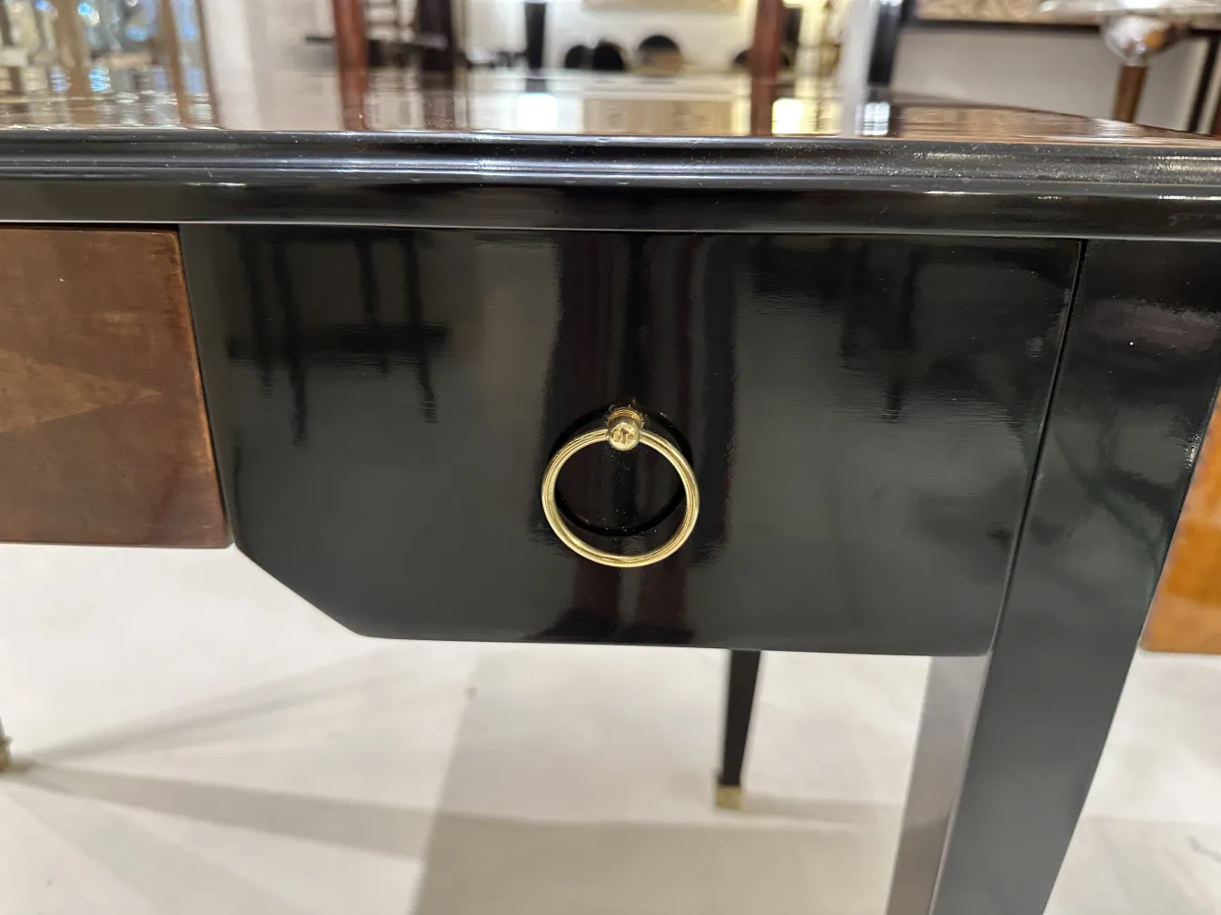 Antique desk with polished finishes and two drawers