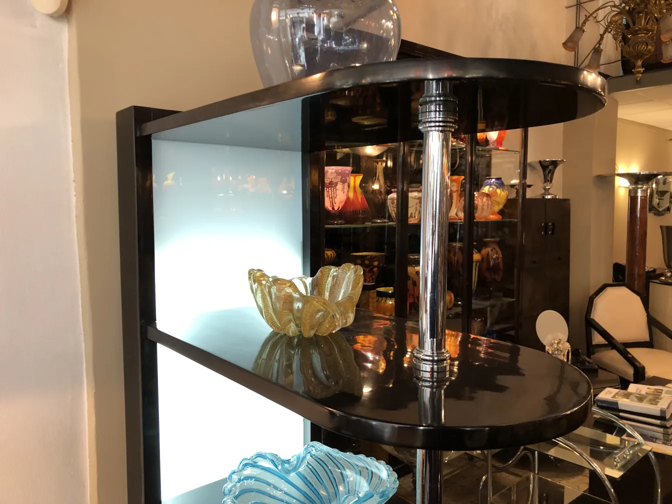 Antique bar cabinet with elegant shelves and decor