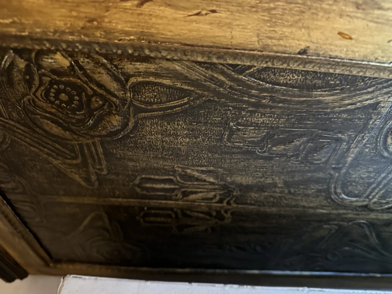 Antique bar featuring beautiful reliefs on the surface.