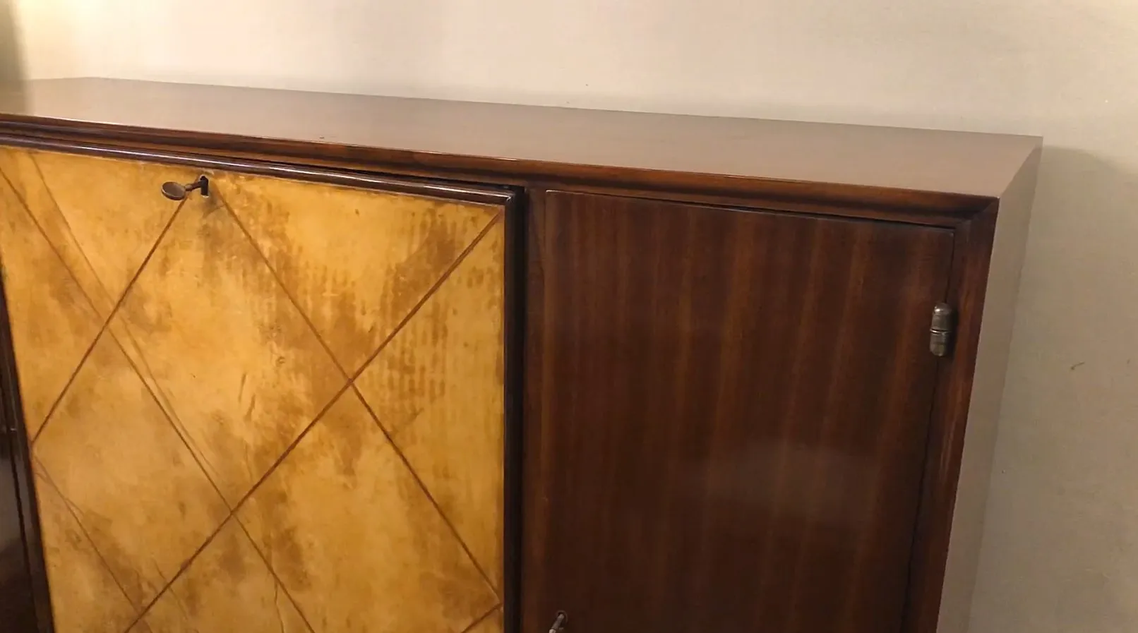 antique art deco bookcase with compartments