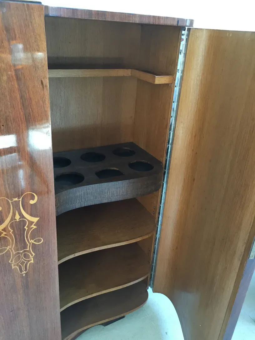 antique bookcase with compartments and decorative details