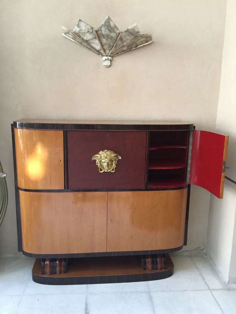 elegant antique bookcase with decorative details
