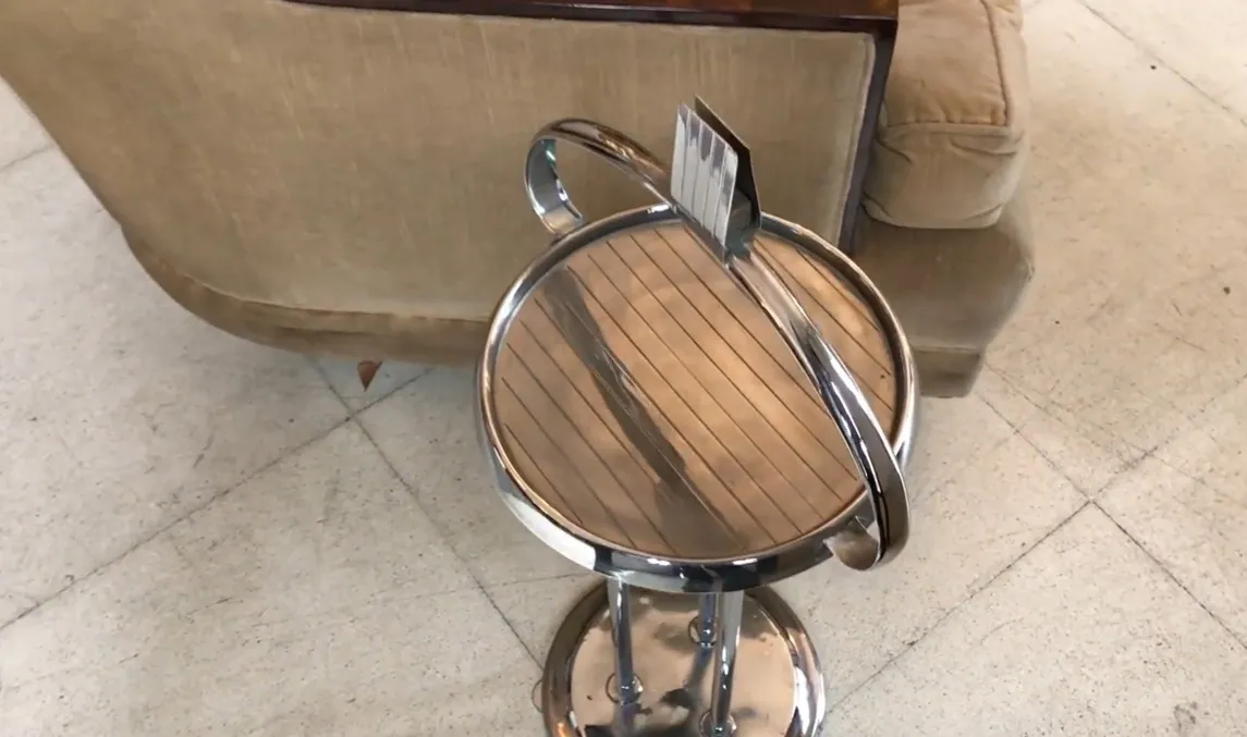 antique small round table with shiny details in the environment