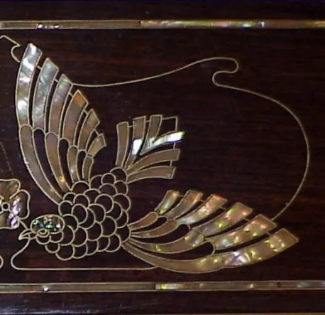 detail of an antique desk eugenio quarti with birds