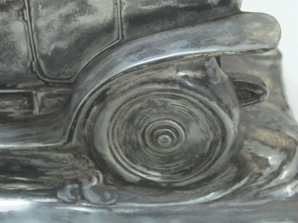 antique WMF inkwell featuring detailed base design