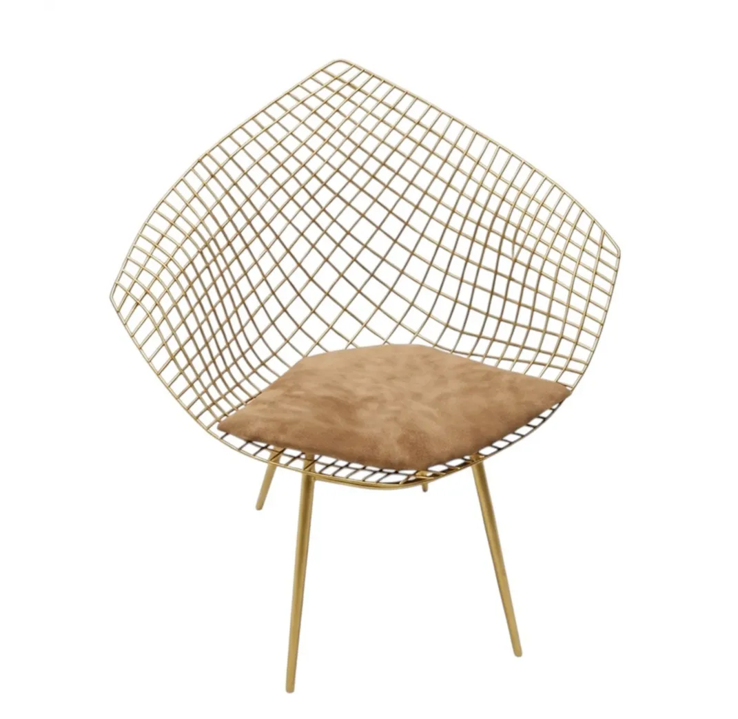 Antique garden chairs with unique design in a cozy setting.