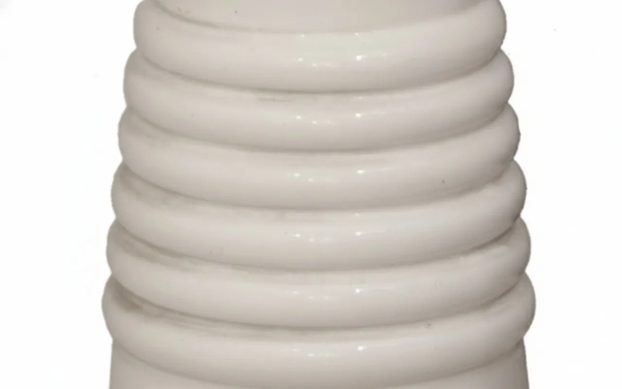 white antique planter with ribbed design