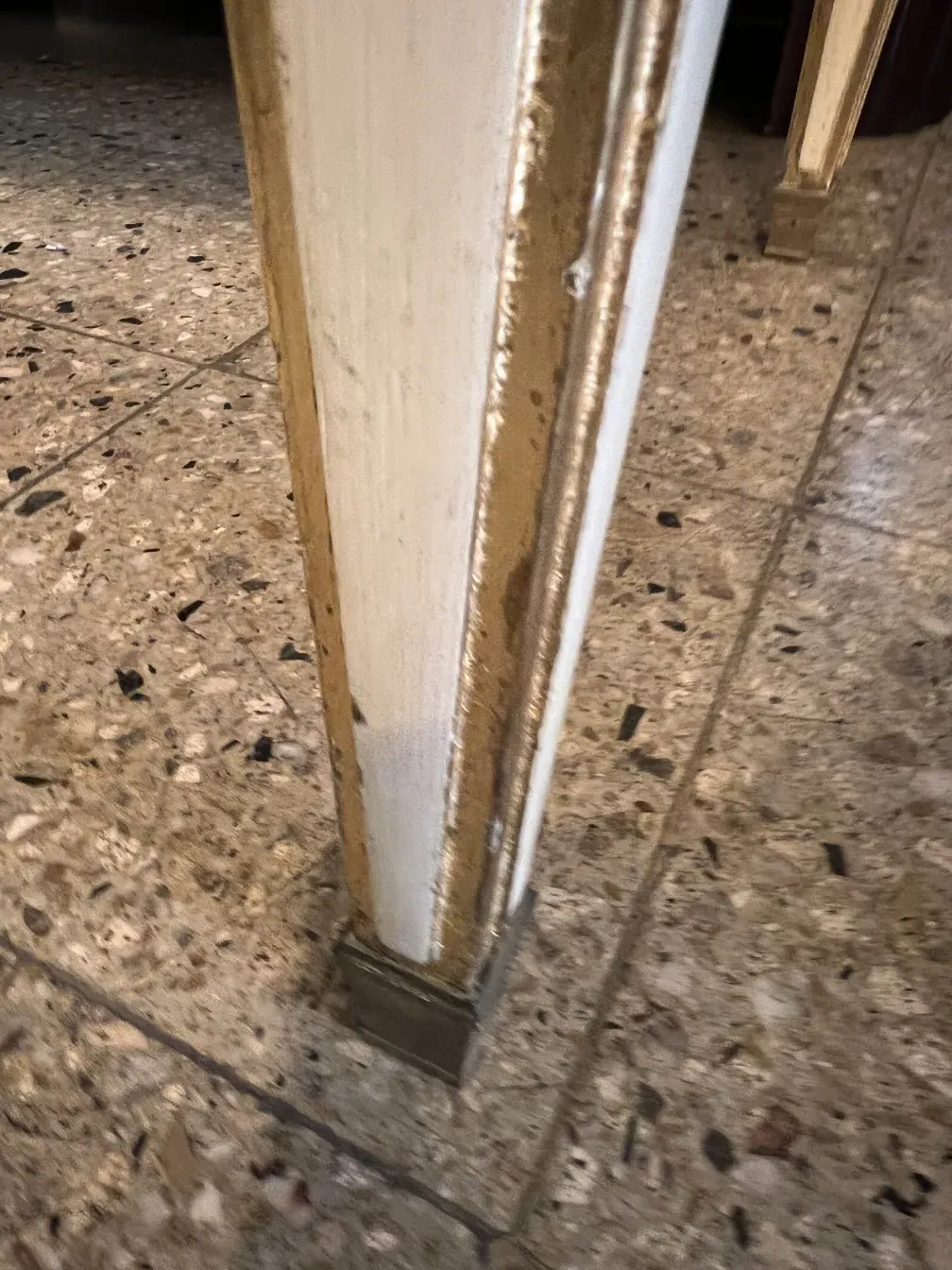 Detail of the leg of an antique desk from Alvear Palace