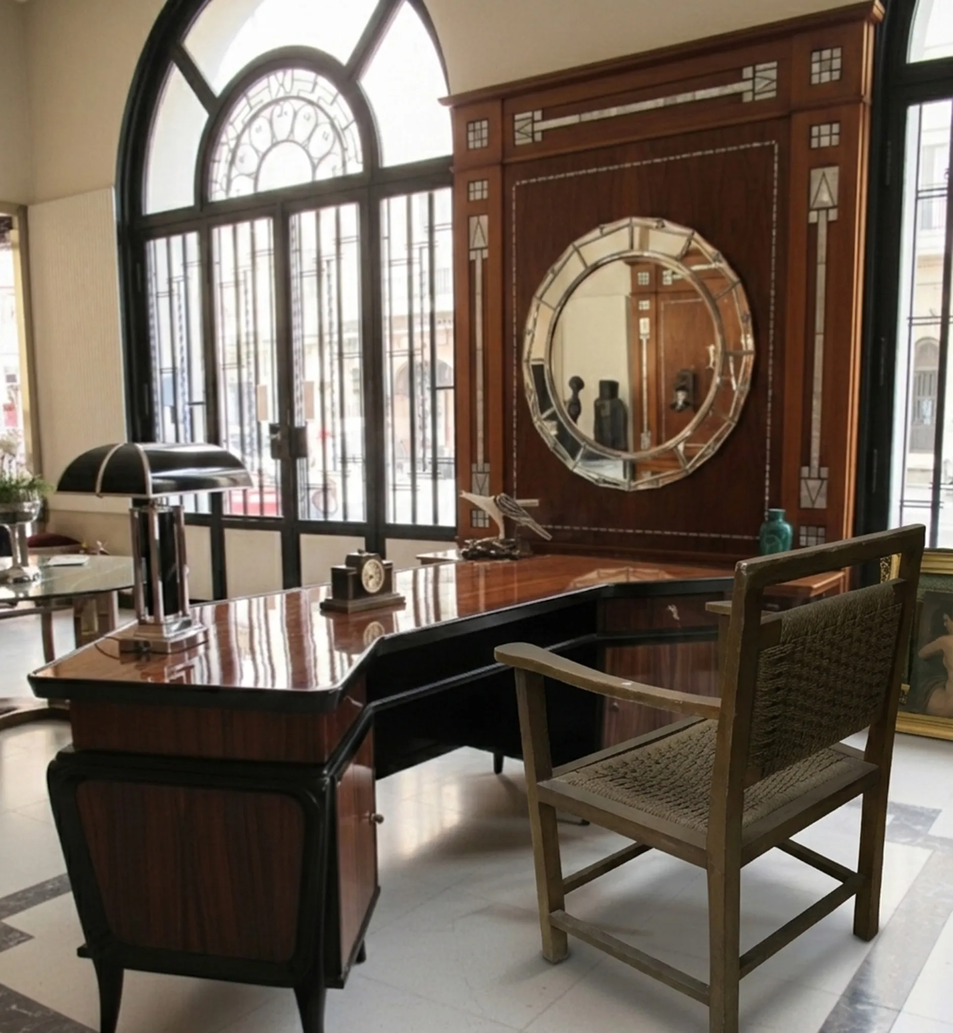 Antique armchair with decorative details in an elegant setting.