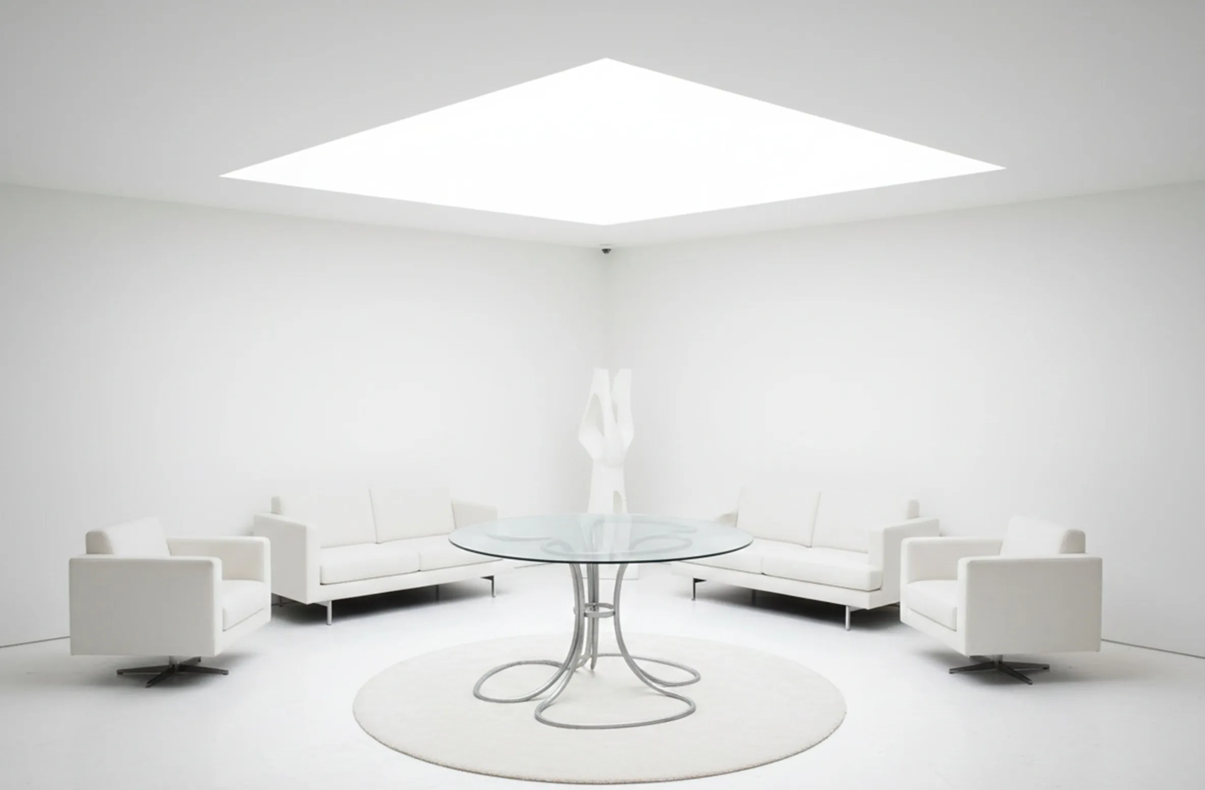 Antique dining table with chairs in a modern setting.