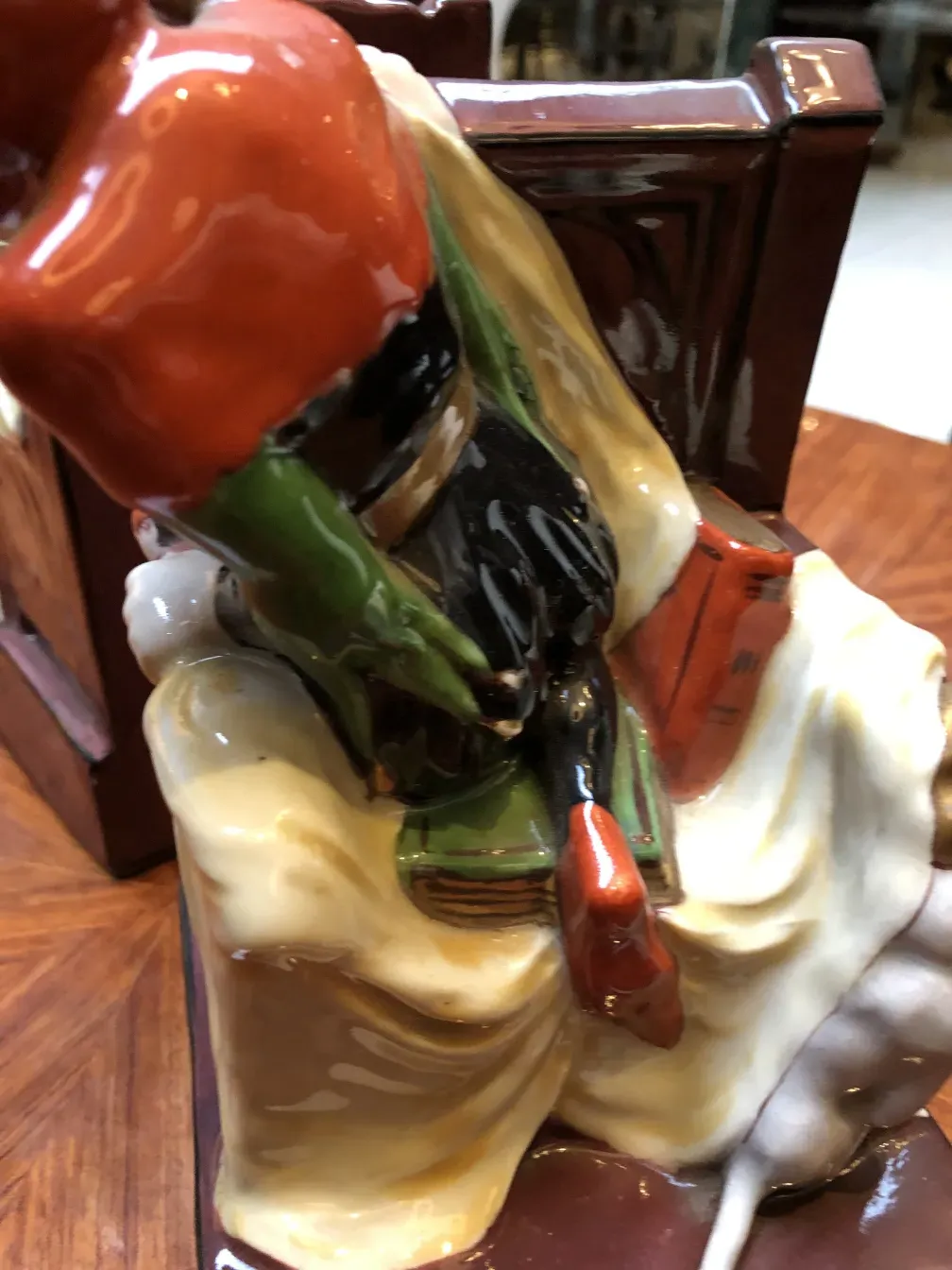 antique bookends featuring artistic detail and vibrant colors