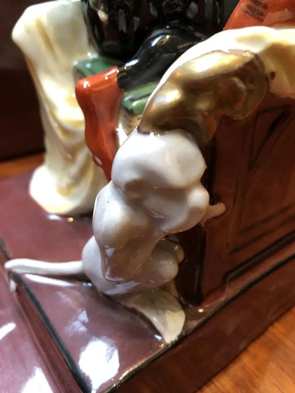 Antique bookends in Art Nouveau style featuring artistic details.