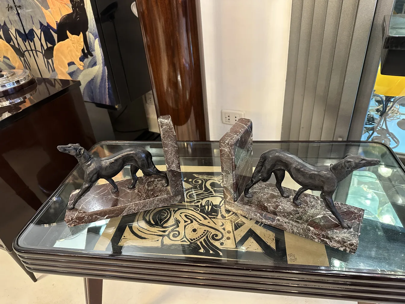 Antique bookends shaped like dogs in marble.