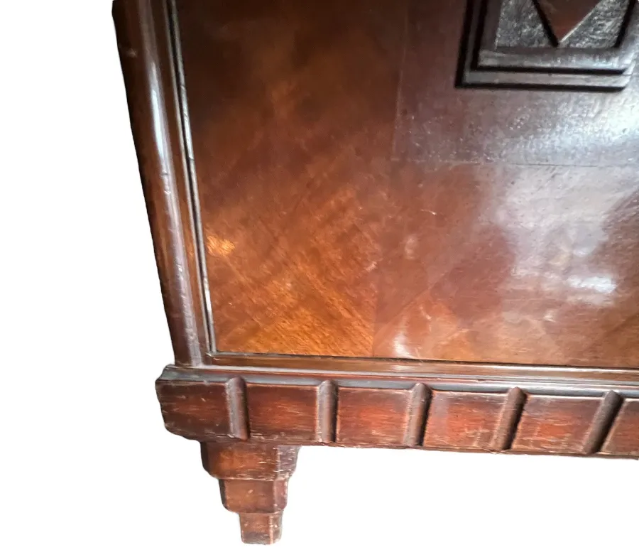 Details of an antique bookcase featuring elegant and sturdy design.