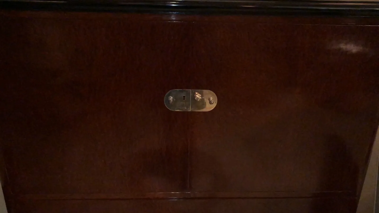 antique wooden bookcase with a lock