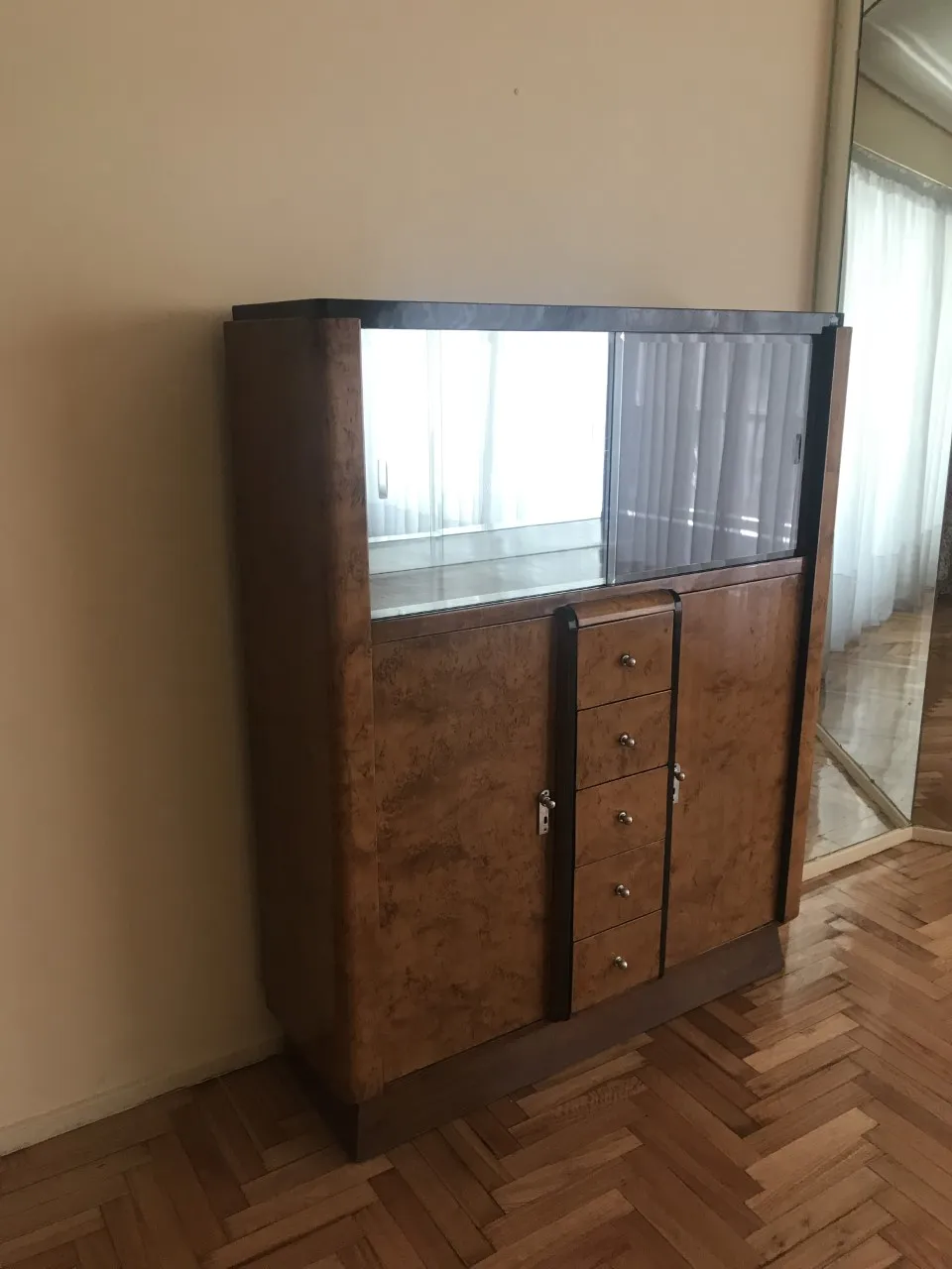 Antique bookcase with sliding glass doors and shelves