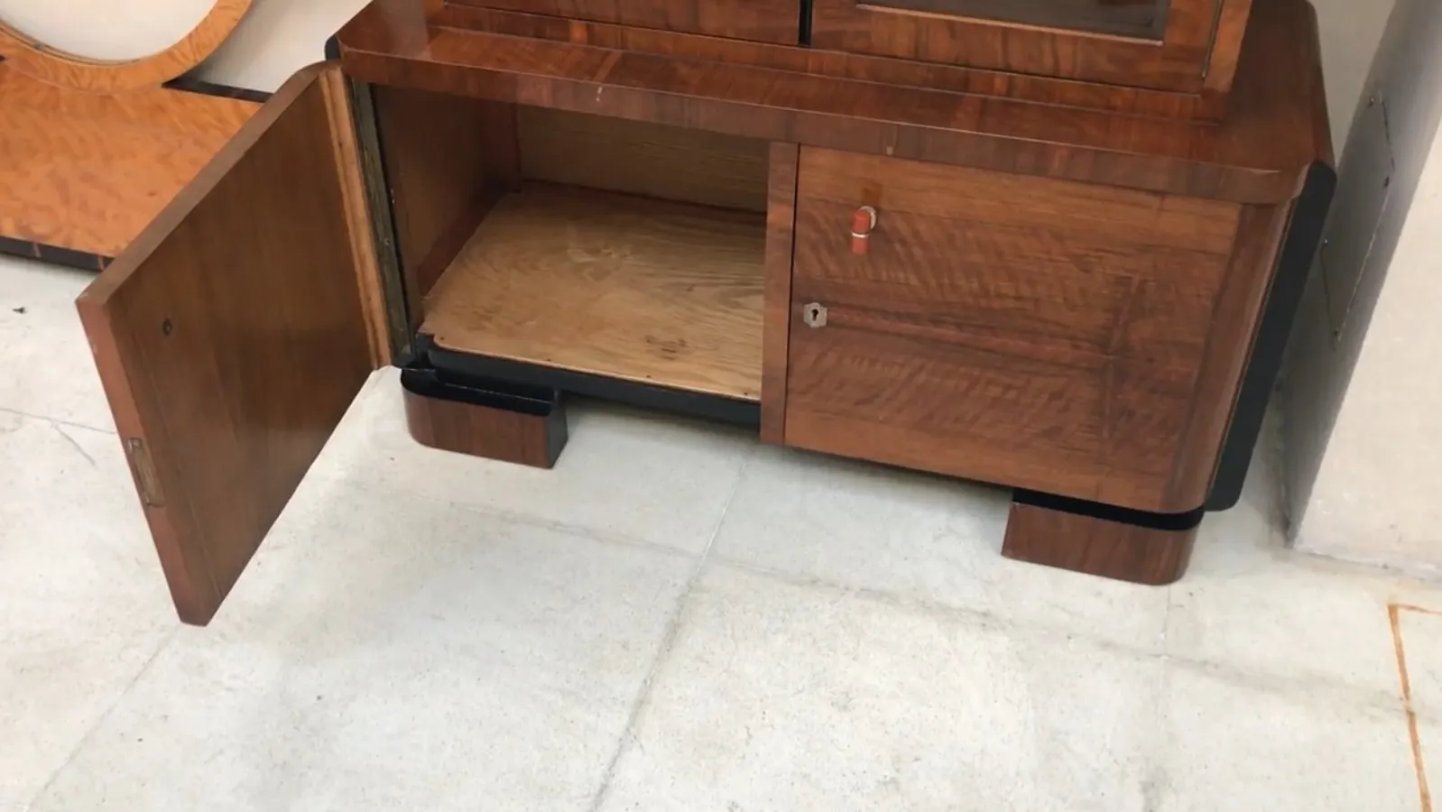 antique bookcase with an attractive design, space for books and decorations