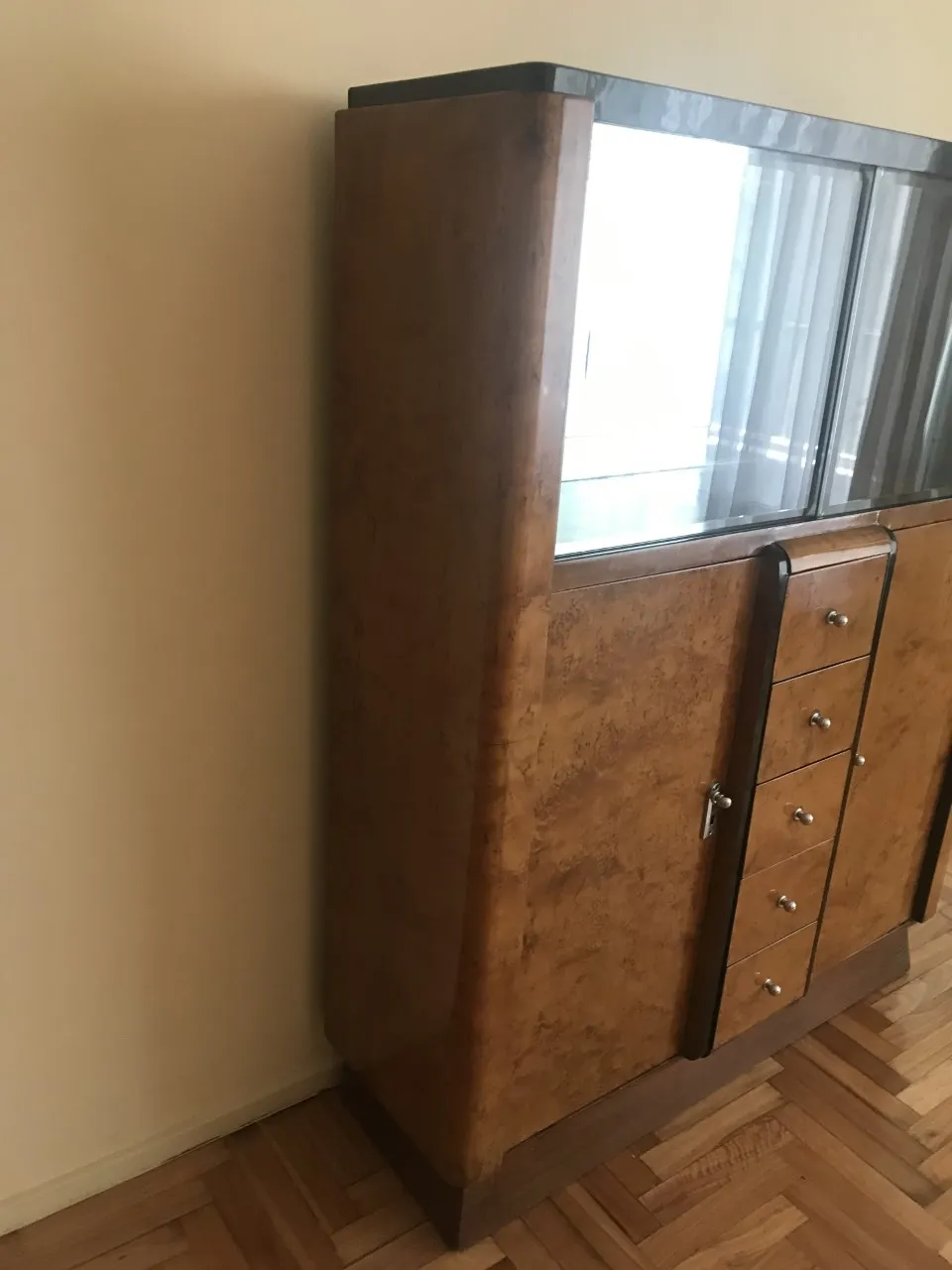 antique bookcase with classic shape and elegant details