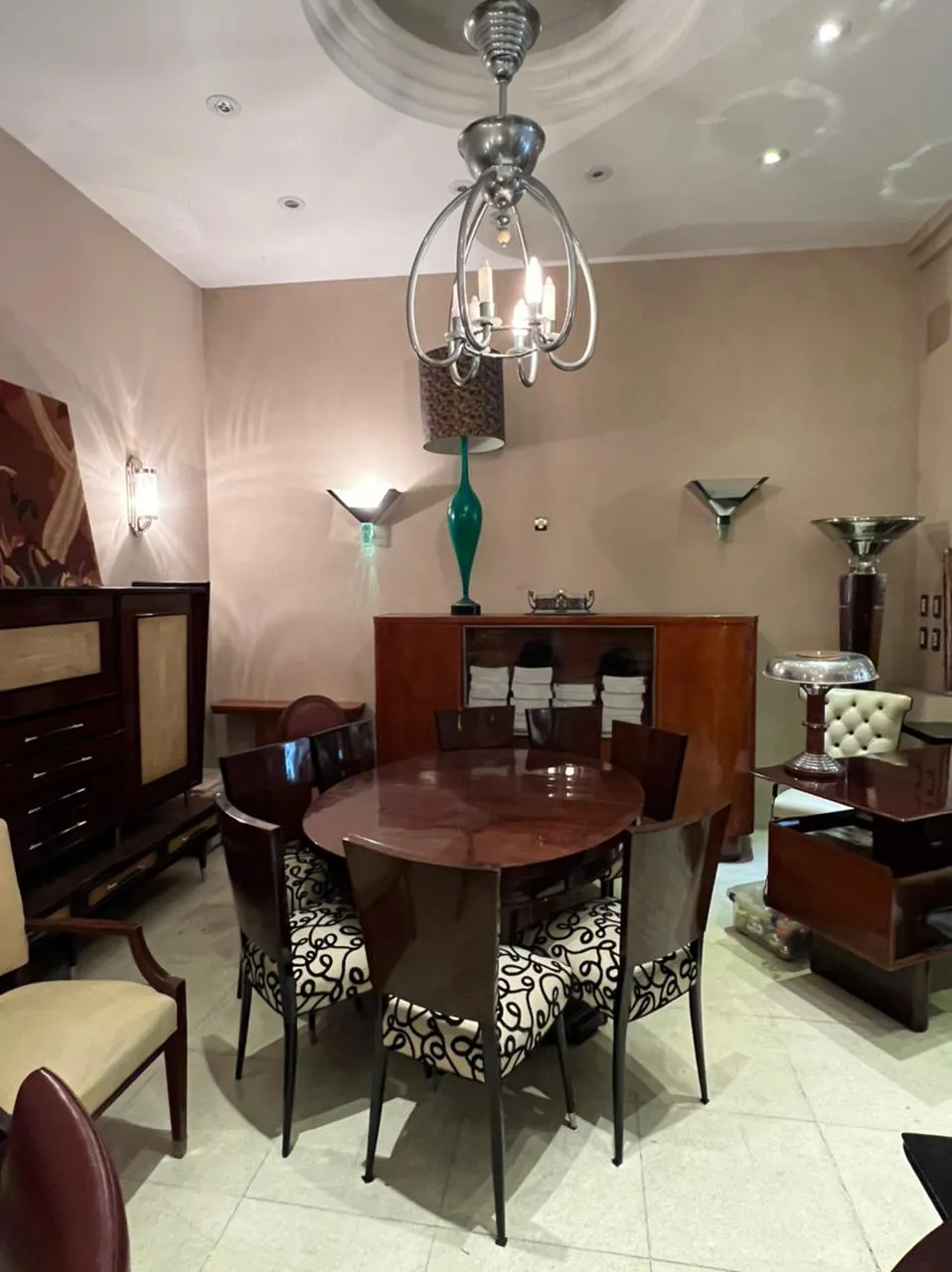 Antique bookcase with elegant details and ambient decor.