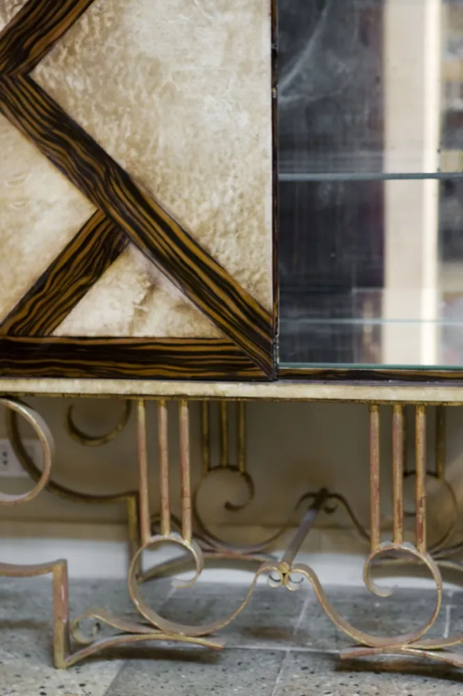 Antique gilbert poillerat bar cabinet with unique design