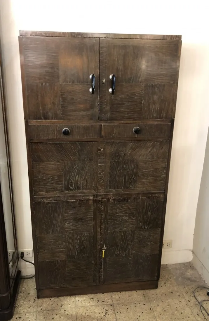 Antique bar cabinet with two doors and drawers, brown finish
