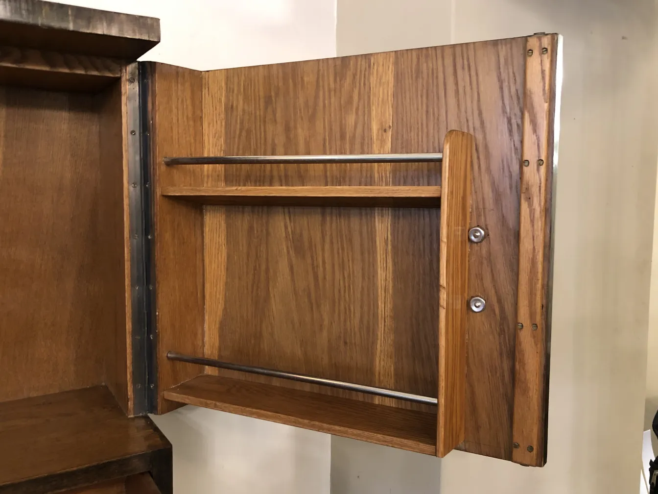 Antique wooden bar cabinet with internal shelves