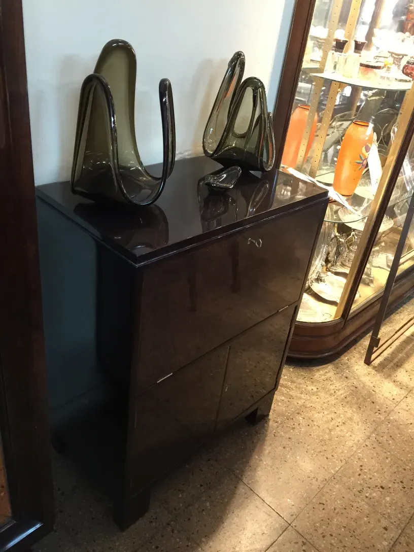 Antique bar with elegant design and glass accents.