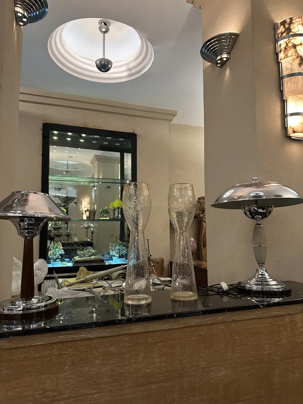 Antique bar with glasses and shiny accessories in an elegant setting.