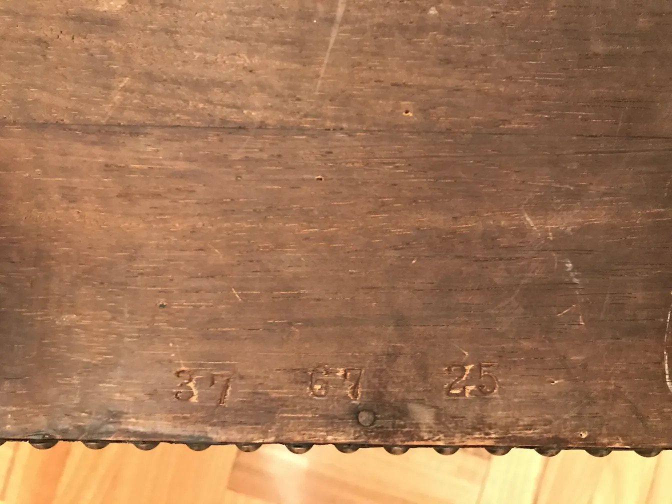 Antique wooden bar cabinet with subtle details.