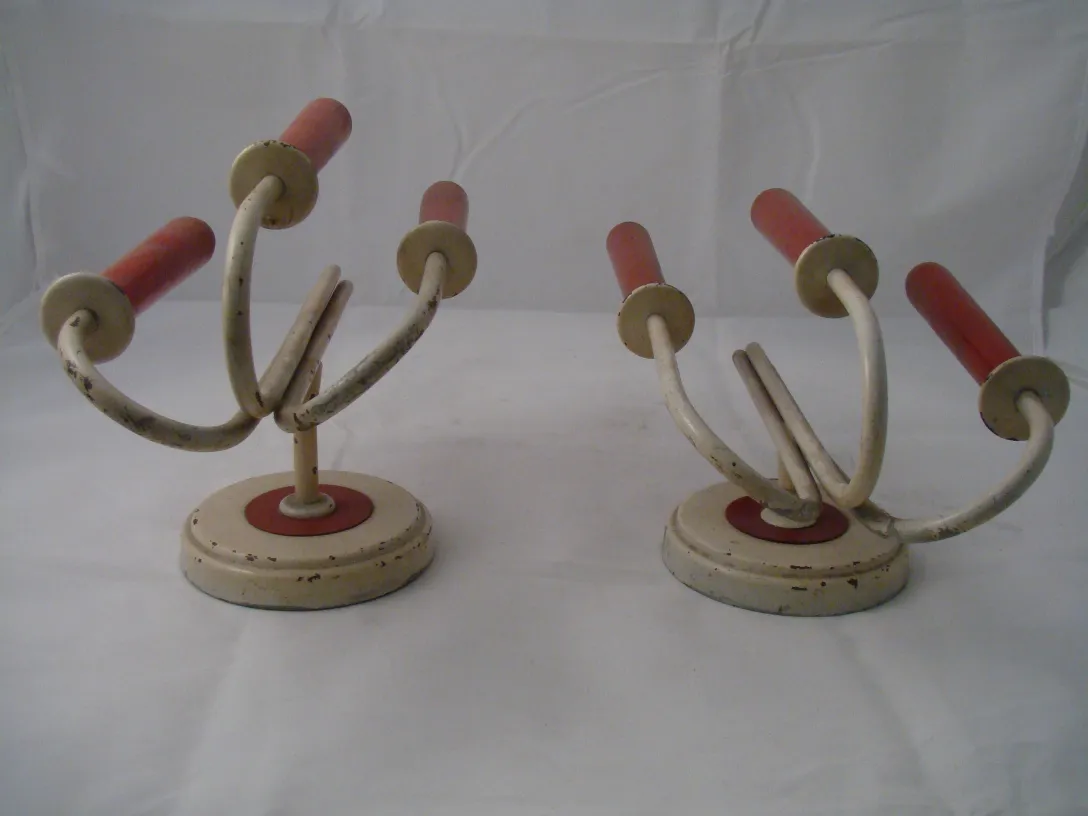 Pair of antique sconces with red accents, elegant style