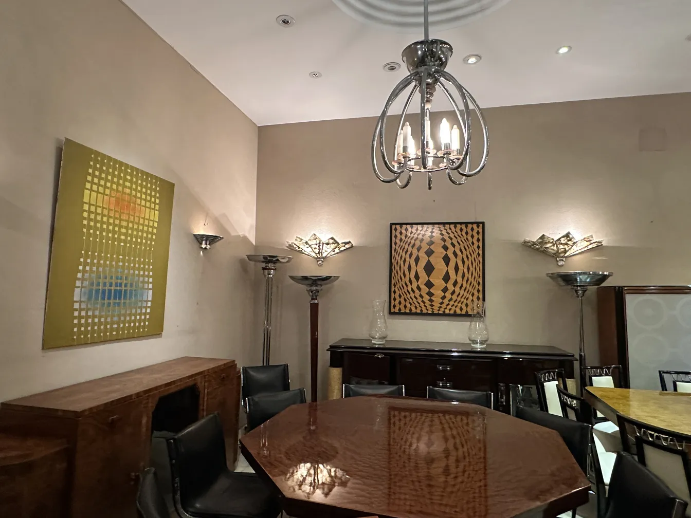 Pair of antique sconces brightening a modern living space.