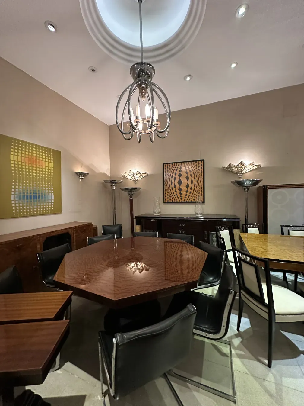 Pair of antique sconces illuminating a modern ambiance.