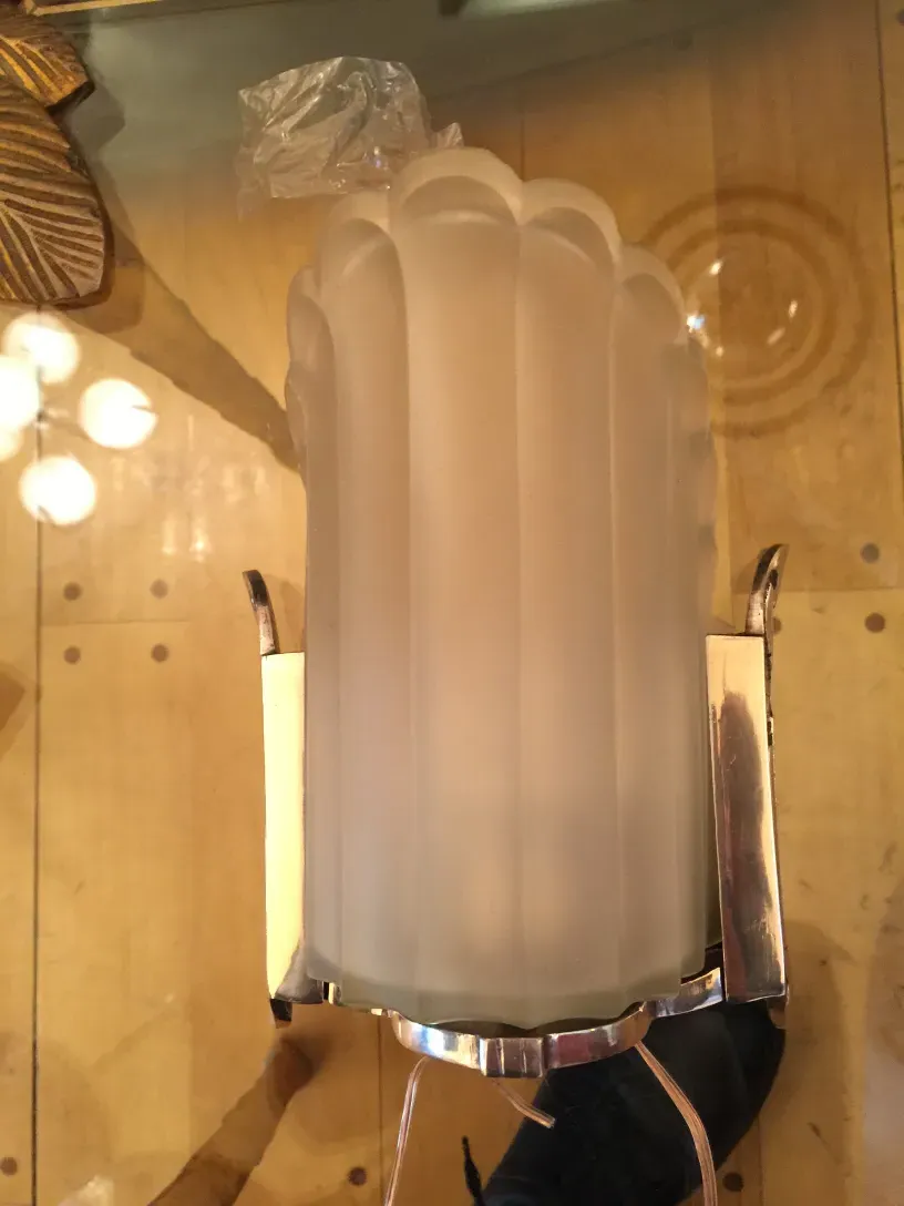 Antique sconces with elegant design, creating a warm ambiance.