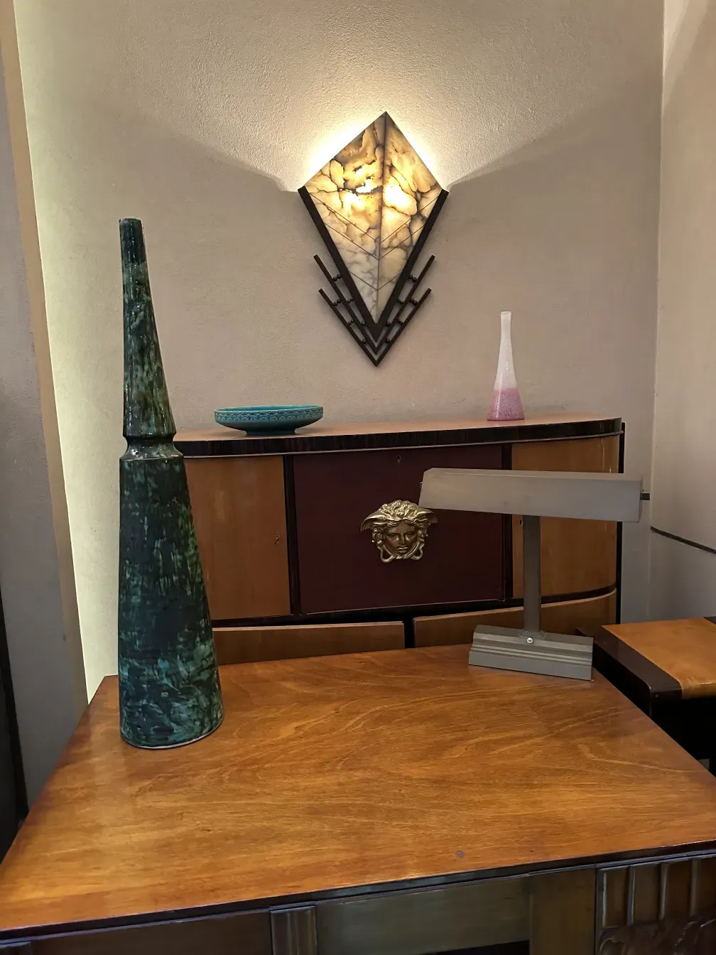 Antique sconces with soft light in modern setting