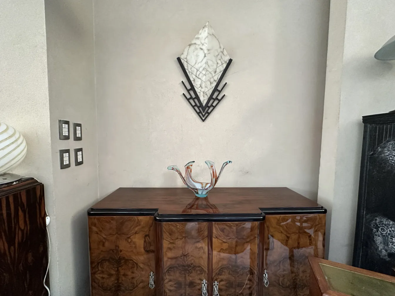 Pair of antique sconces on the wall with elegant design