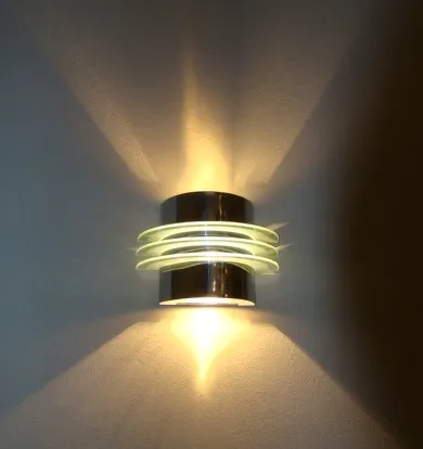 Antique wall sconce with warm light and circular design