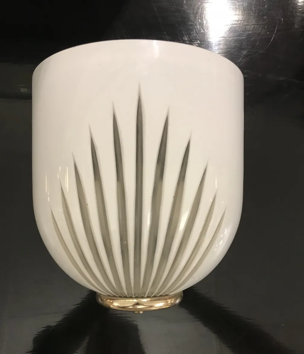 Antique white sconces with elegant details