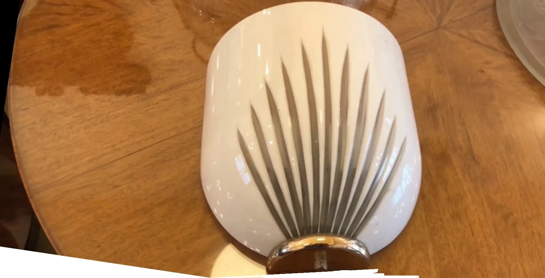 Pair of vintage-style sconces featuring white design details