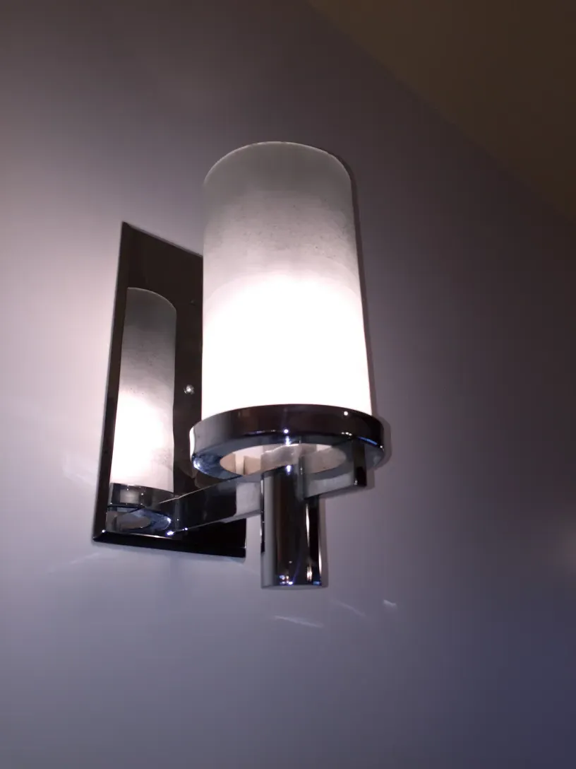 Antique simple light sconces, contemporary design, elegant atmosphere.