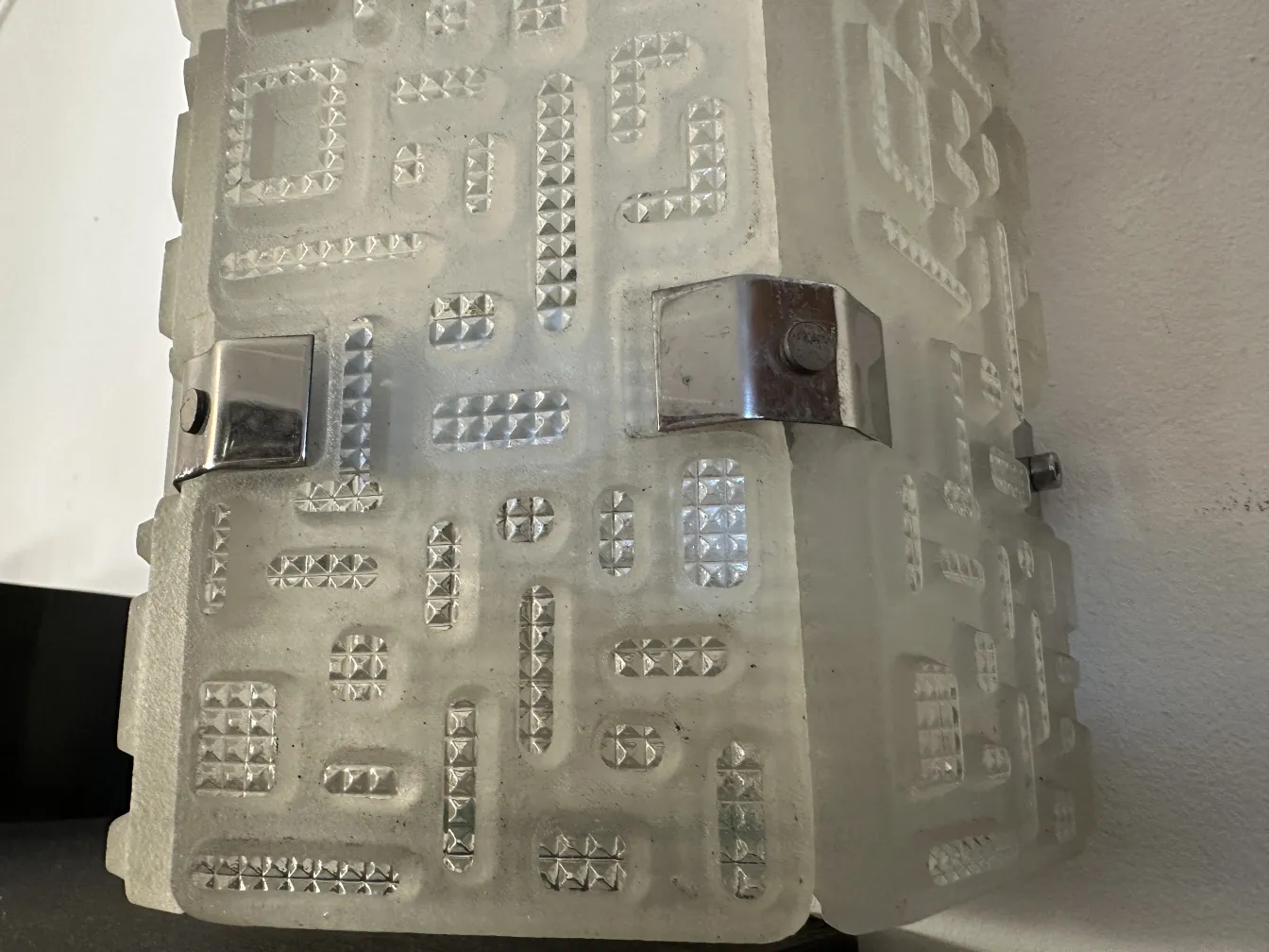 Antique orrefors sconces with geometric light design