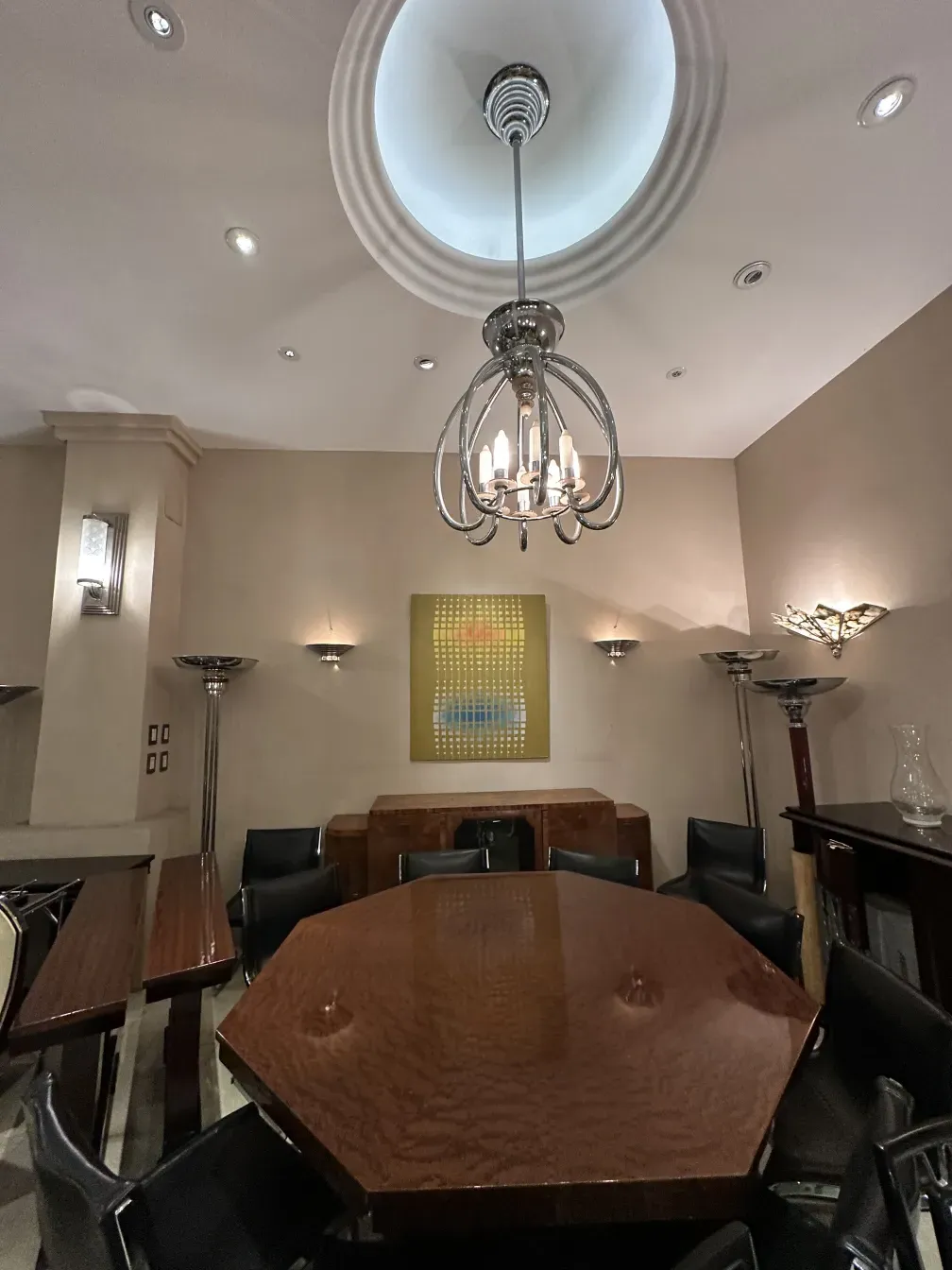 Pair of antique sconces lighting the room elegantly.