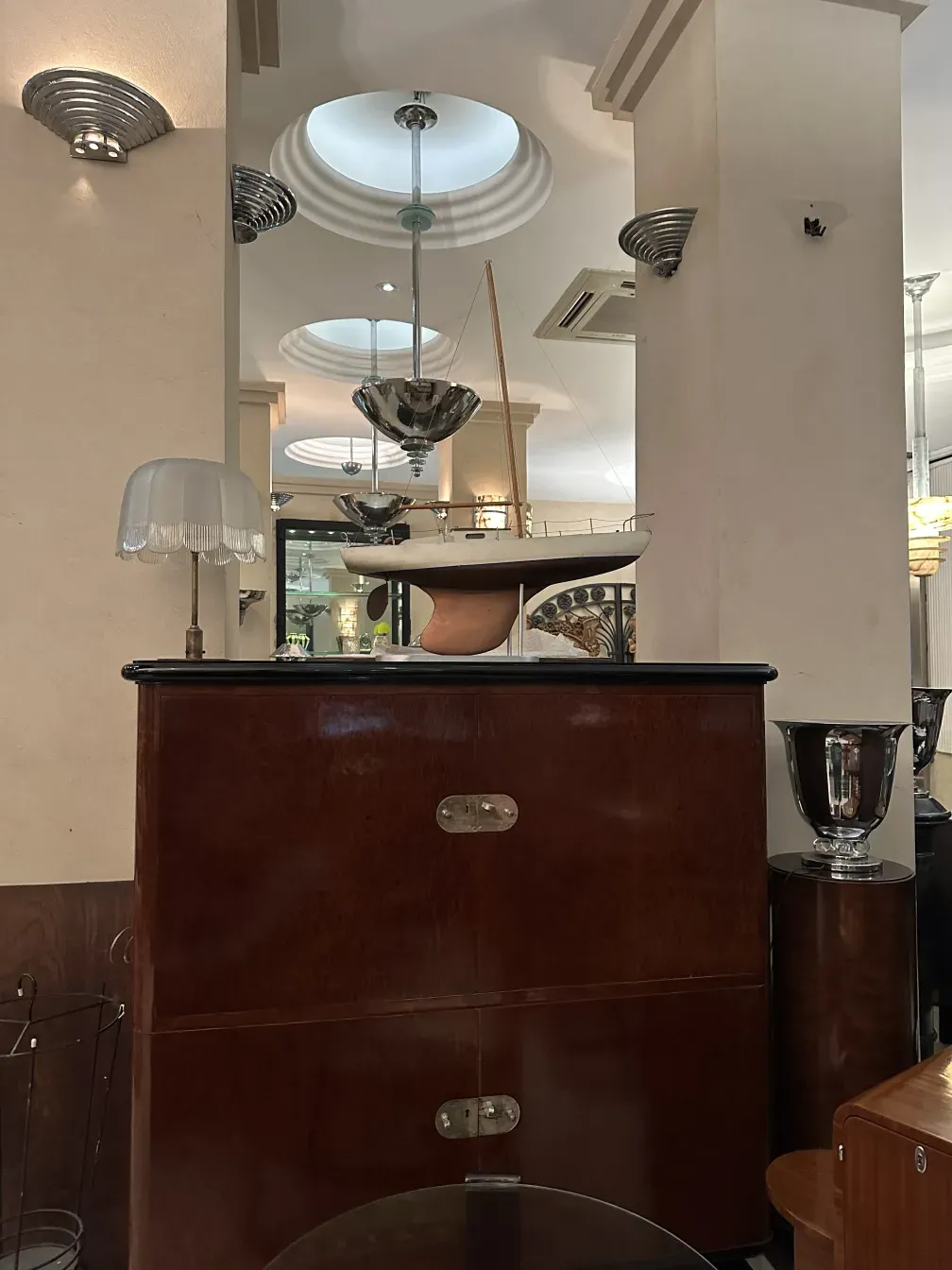 Antique pair of sconces in a cozy decorative setting