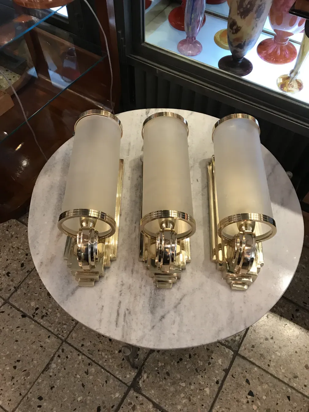 Pair of antique sconces with classic design in an elegant setting