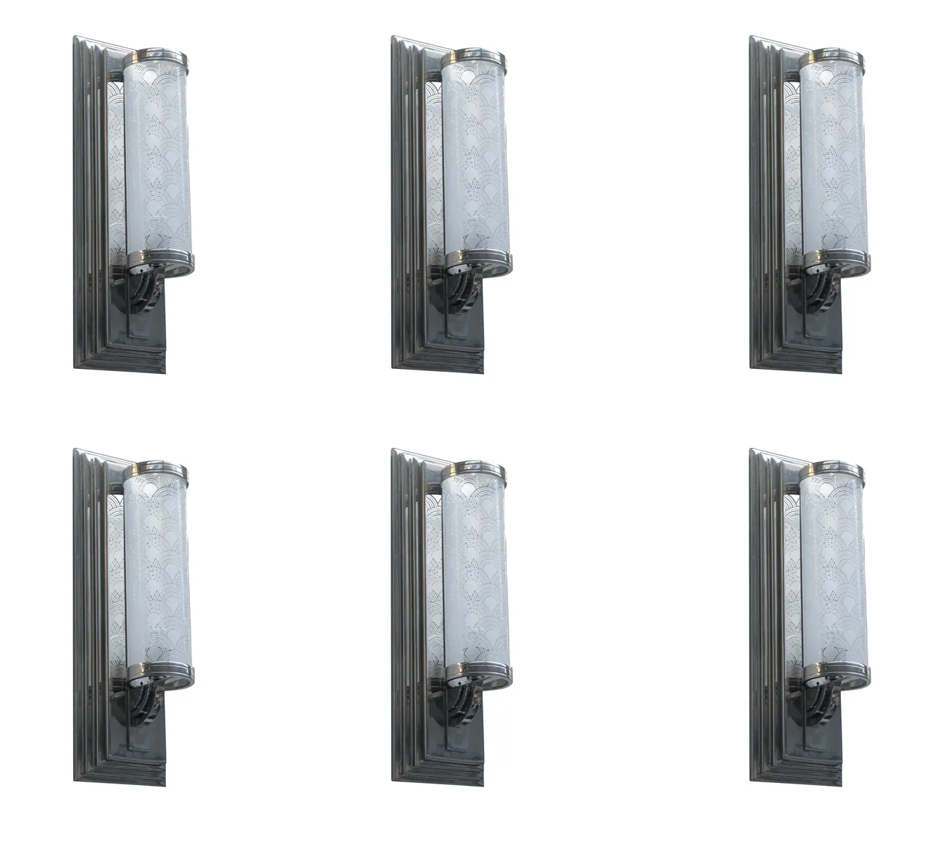 Pair of antique sconces featuring decorative glass, soft lighting