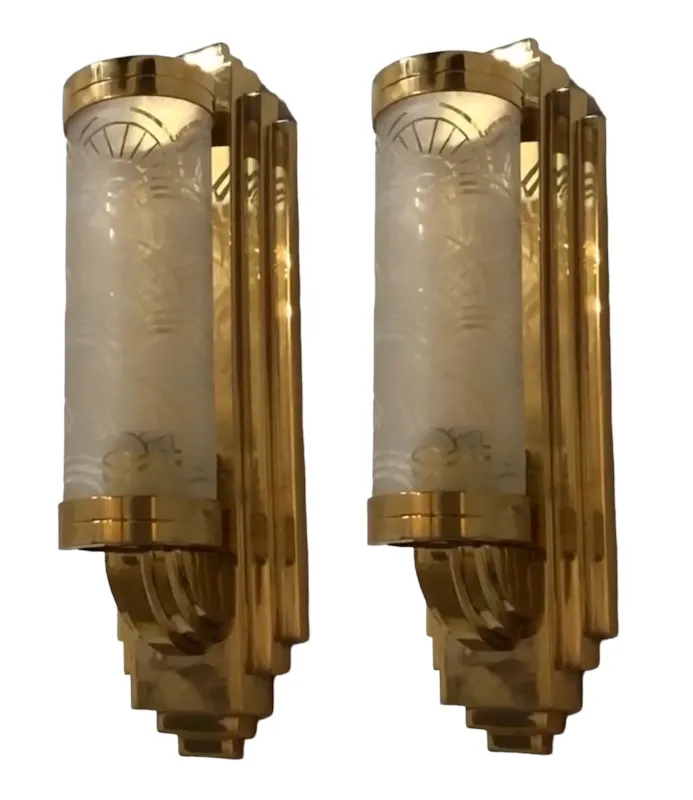 Pair of antique gold sconces with elegant details