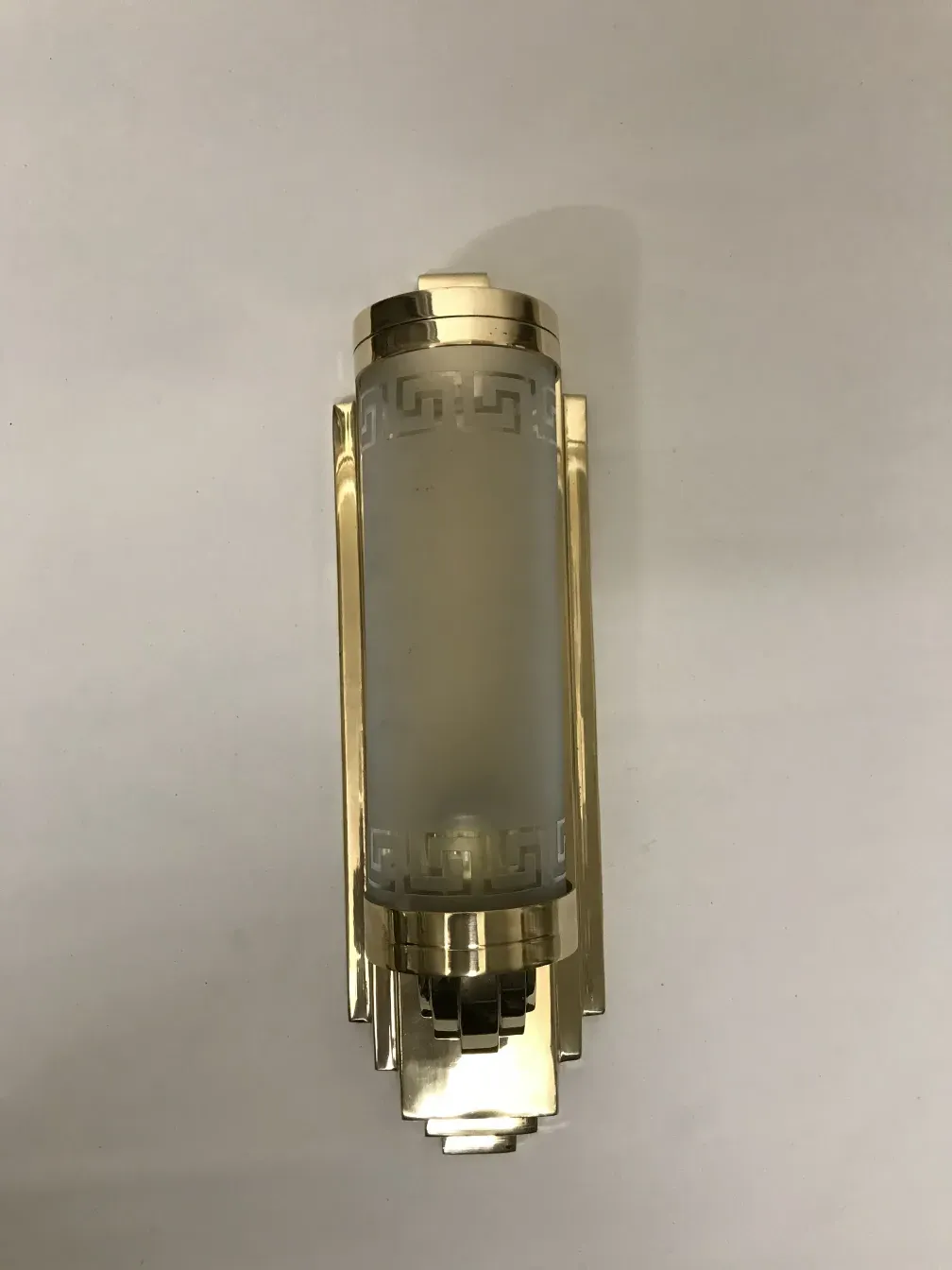 Elegant antique sconces with decorative details