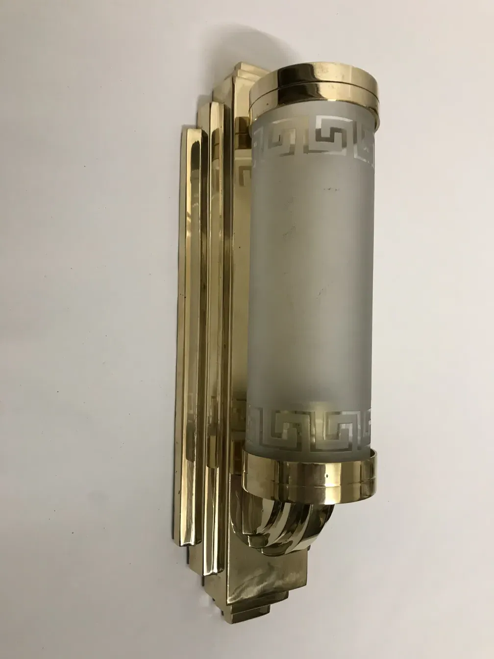 Pair of antique sconces with elegant design and soft light