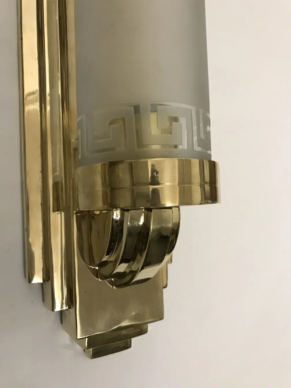 Antique sconces with golden details, enhancing the decor