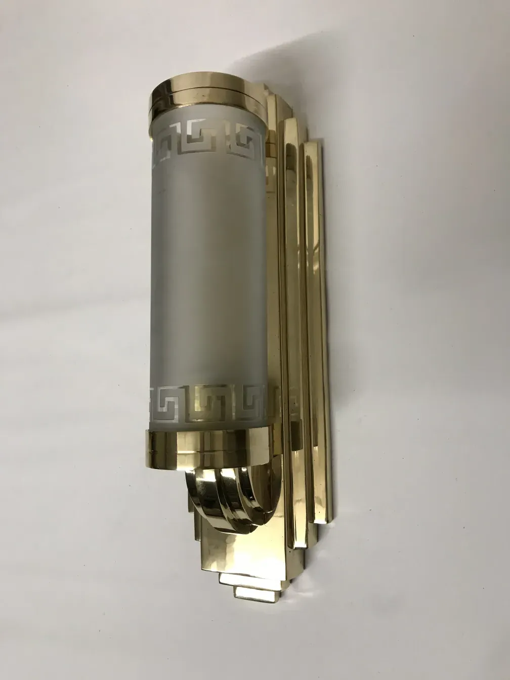 Pair of antique sconces with elegant gold design